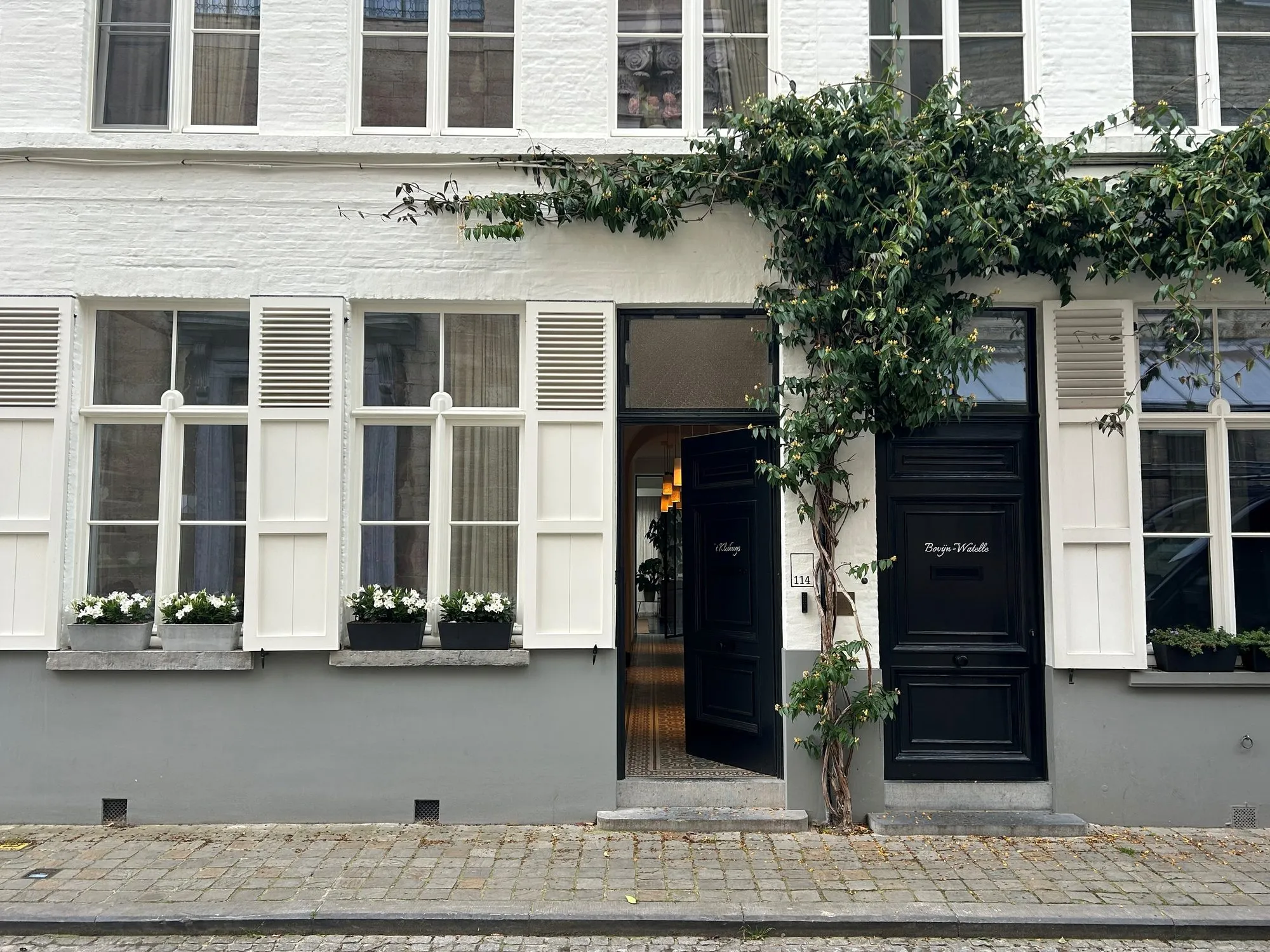 The historic facade of 't Kleihuys on Carmersstraat in Bruges